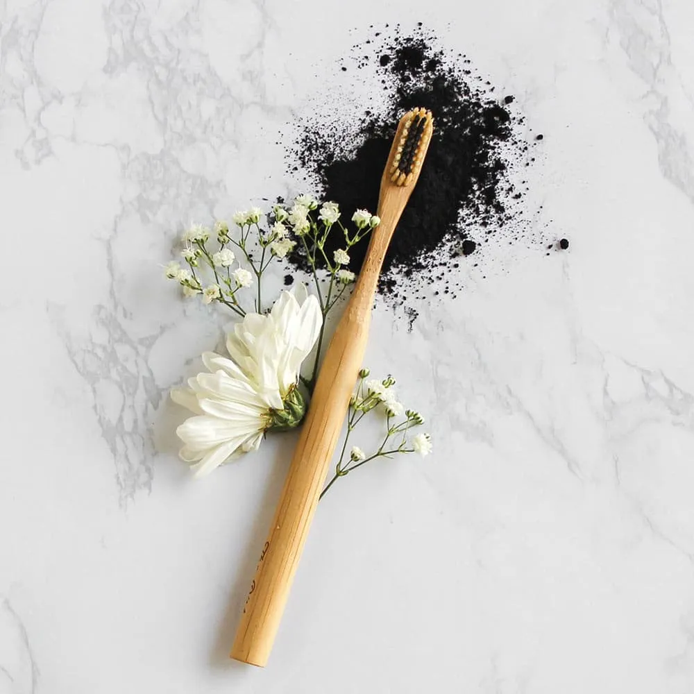 Buy with Prime - Bamboo Toothbrush with Charcoal Infused Bristles