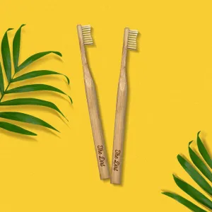 Buy with Prime - Bamboo Toothbrush with Charcoal Infused Bristles