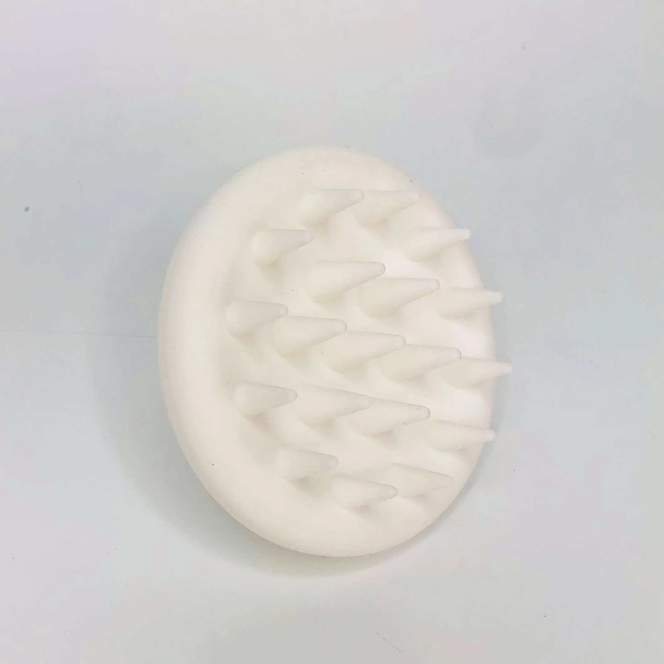 Round handheld silicone scalp massager: Blossom